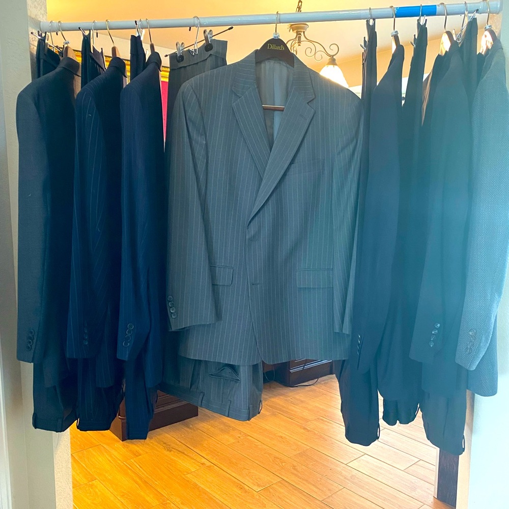 8 men’s 2-piece suits. Excellent condition. Cuffed pants. Price is per suit.